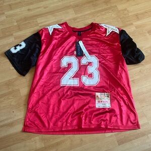Large baggy jersey, red and black with stars